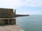 View of harbour, pier and clock tower in Porthleven Cornwall England