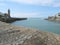 View of harbour, pier and clock tower in Porthleven Cornwall England