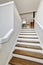 View of hardwood stairs to second floor.