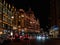 View of the Harrods Department Store on Brompton Road in Knightsbridge, London at night.