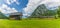 A view of hay drying frame and shed in the alpine meadows approaching lake Bohinj in Slovenia