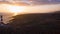 View from the height of the lighthouse silhouette Faro de Rasca at sunset on Tenerife, Canary Islands, Spain. Wild Coast