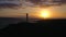 View from the height of the lighthouse silhouette Faro de Rasca at sunset on Tenerife, Canary Islands, Spain. Wild Coast