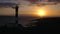 View from the height of the lighthouse silhouette Faro de Rasca at sunset on Tenerife, Canary Islands, Spain. Wild Coast