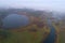 A view from the height of Malenets Lake and the bend of the Sorot river, autumn morning aerial survey