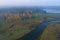 A view from the height of the Mikhailovskoe, foggy October morning top view. Pushkinskie Gory, Russia