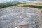 View from a height of an open stone quarry, building stone mining, granite