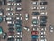 A view from a height to the parking lot. The process of parking. Searching for space in a busy car park. Parking maneuvers. Park