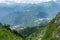 View from the heights of the Valley from residential houses, surrounded by high mountains. Krasnaya Polyana, Sochi