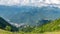 View from the heights of the Valley from residential houses, surrounded by high mountains. Krasnaya Polyana, Sochi