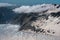 View from a helicopter flight on the glacier and the ocean in the distance