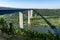 View on high freeway viaduct bridge across Mosel river valley and terraced vineyards, road network and transportation is Germany