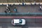 View from high-level walkway of Tower Bridge in London, UK, on the bridge traffic