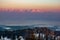 View of High Tatras during sunset from Vysoky vrch over Porac village on Volovske vrchy