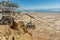 View from a high view of the landscape around the Dead Sea, the parking place in the desert and the starting station of the cable