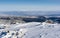 A view of the highest peak of the Zywiec Beskids - Babia Gore in the morning with the Tatra mountains.