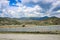 View from the highway to the mountain plateau Karabi-Yayla. Crimean landscape with mountains, vineyards and blue sky with cirrus