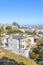View from a hill of a dense houses in San Francisco, California against the blue sky