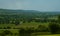 View from the hill on landscape in rural Normandy and storm forming in the distance