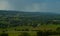 View from the hill on landscape in rural Normandy and storm forming in the distance