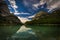 View on Hinterer Gosausee under Dachstein with deep blue sky and perfect reflection on water near Salzburg