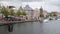 View of historic area of Haarlem on banks of Spaarne river overlooking Teylers Museum and tall belfry of Protestant