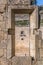 View of historic building in ruins, convent of St. Joao of Tarouca, detail of ruined wall with hole door, and blurred background