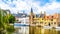 View of the historic buildings from the Dijver canal in the city of Bruges, Belgium