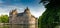 View of the historic Chateau Trecesson castle in the Broceliande Forest with reflections in the pond