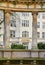 View through historic colonnades onto a pharmacy in Berlin.