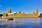 View of the historic eastern facade of the Palace of Westminster from across the River Thames