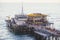 View of historic Santa Monica pier, with beach, amusement park, shops and restaurants, Los-Angeles, California, United States of