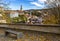 View of historical center of Cesky Krumlov town on Vltava riverbank on autumn day, Czechia