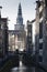 A view the historical city center with the Old Church OUDEKERK tower in the background,Amsterdam,The Netherlands