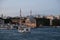 View of the historical Dolmabahce Mosque Bezmialem Valide Sultan Mosque from the sea in the evening