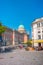 View of historical downtown in Potsdam with Saint Nicholas Church and street cafes and restaurants at blue sky and sunny day,