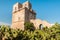 View of the historical fortification tower - Torre Colimena in village Manduria, province of Taranto, Puglia