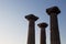 View of historical ruins with clear, blue sky background captured in the temple of Athena at the ancient city of Assos