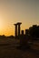 View of historical ruins at sunset captured in the temple of Athena at the ancient city of Assos