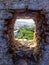View from a hole in the wall in Obidos, Portugal