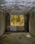 View through the hole for a windows in a damaged abandoned panel house