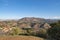 View of Hollywood Sign from Hollywood Hills. Warm sunny day. Beautiful clouds in blue sky