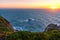 View of the horizon and the setting sun from the cliffs of Cabo da Roca at sunset. The westernmost point of Europe.