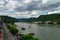 View from hotel window on Sankt-Goar embankment and Snak Goarshausen medieval village and Rhine vineyards on slope of the hills in