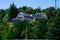 View of a house in the forest taken from Puerto Panuelo