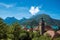 View of houses with belfry, in the village of Talloires, next to the Lake of Annecy.