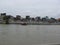 View of houses and ferry boat along the Pasig river, Manila, Philippines