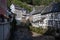 View of houses and streets of old colourful German town Monschau in bend of the river and hidden between the hills, Eifel national