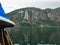 The view a huge cliff off the coast of East Redonda Island, from the starboard side of a boat sailing through Waddington Channel