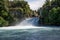A view of Huka Falls from a river cruise boat